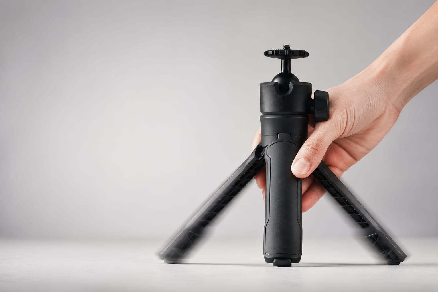 Quick-Release Desktop Tripod configured with a phone and compact fill light