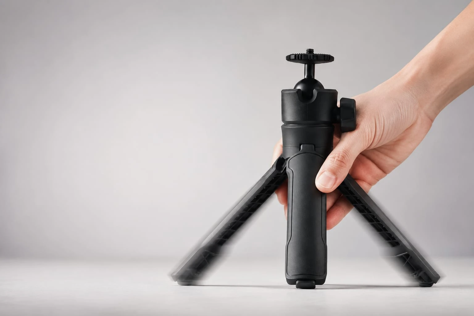 Quick-Release Desktop Tripod configured with a phone and compact fill light